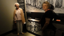 Eva Fahidi with her pic in Holocaust Museum