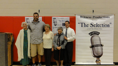 Former University of Wisconsin offensive lineman, Gabe Carimi, hosted the Meeting History tour in his hometown of Cottage Grove, Wisconsin and welcomed Auschwitz survivors Eva Fahidi, Magda Brown and Erzsebet Szemes.  He gave the opening remarks and welcomed the creator of the Wartime Witness documentary Wartime Witness